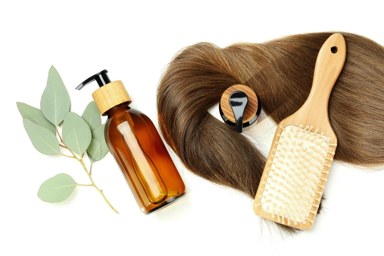 Hair care with suitable hair loss shampoo and hair brush.