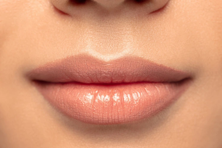 Close up view of a lady with full and luscious lips.
